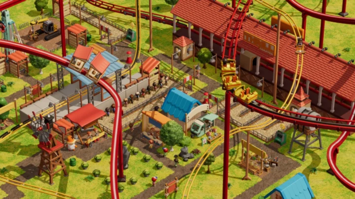 Montanha-russa em ação com visitantes na fila em um dos parques de RollerCoaster Tycoon Wonderworks