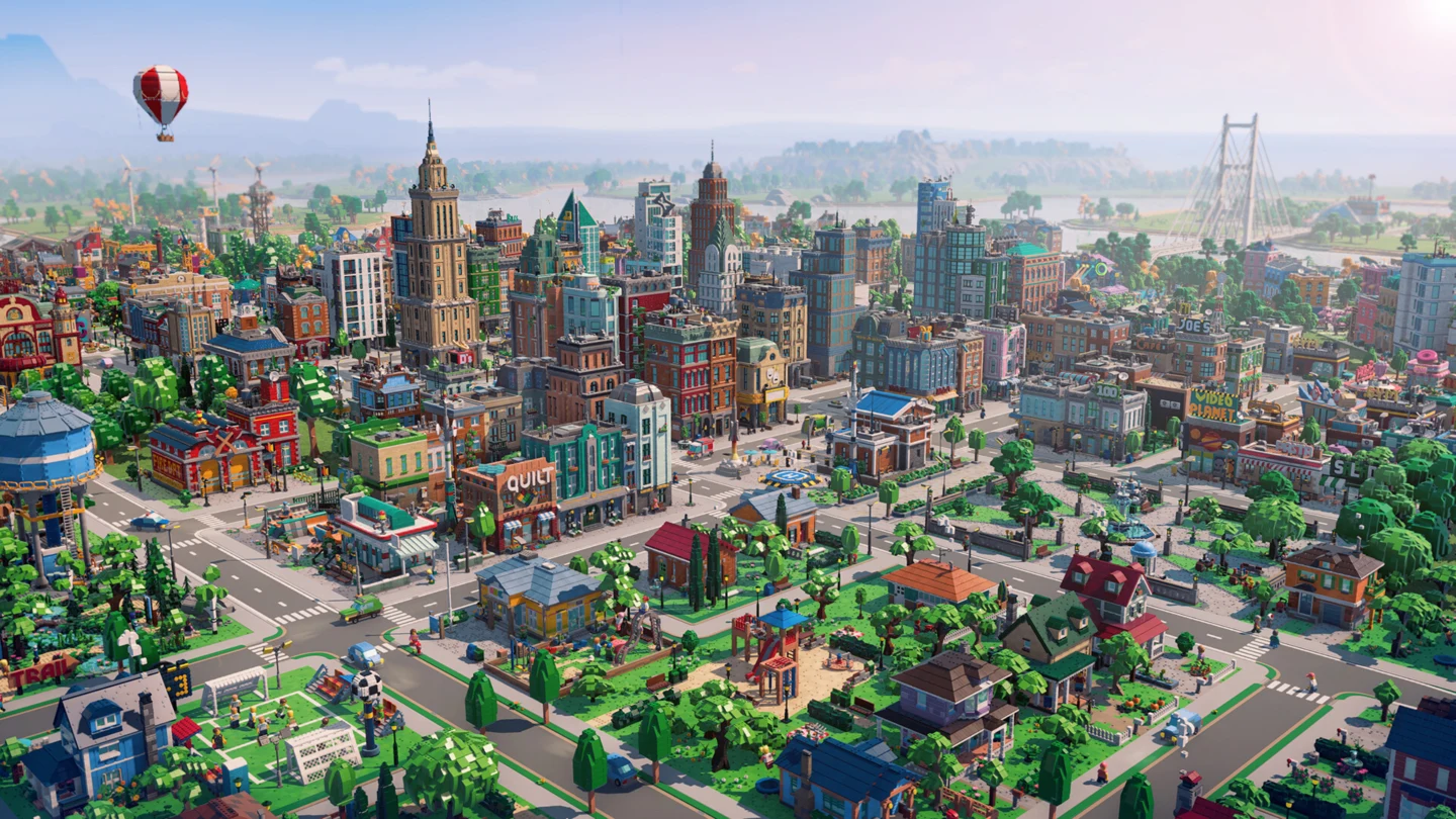 Vista aerea de uma cidade construida em pecas de LEGO, com arranha-ceus, casas e um balao de ar quente