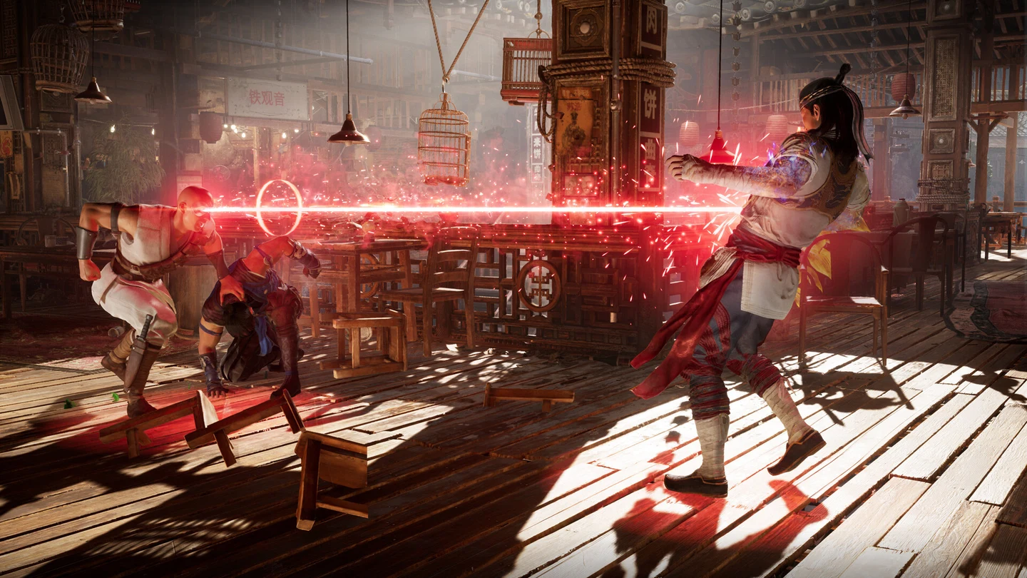 Kano dispara o laser do olho biônico contra Liu Kang em Mortal Kombat 1
